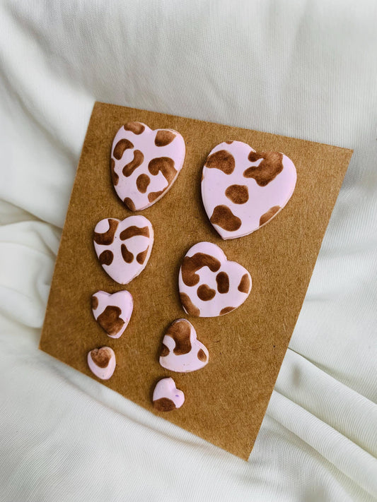 Leopard pattern embossed in heart shaped stud earrings in four sizes