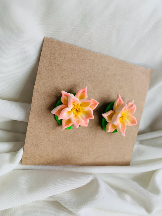 Pink lotus with a lotus leaf stud earrings
