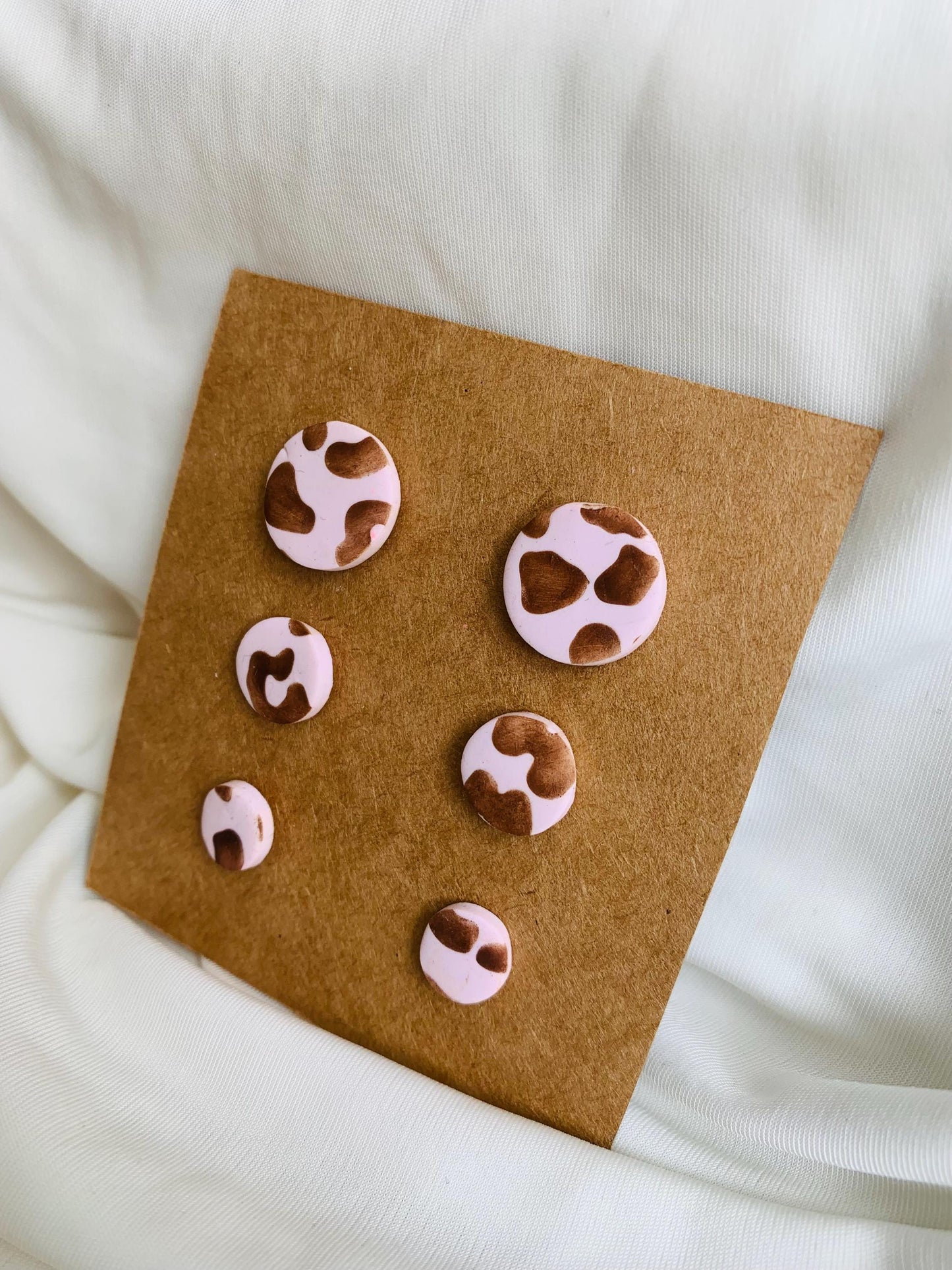 Leopard print embossed in circle shaped stud earrings in three sizes
