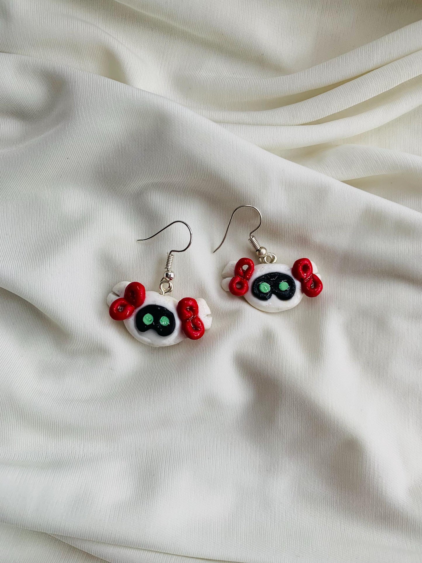 BTS Jin Wootteo in cute little bows earrings
