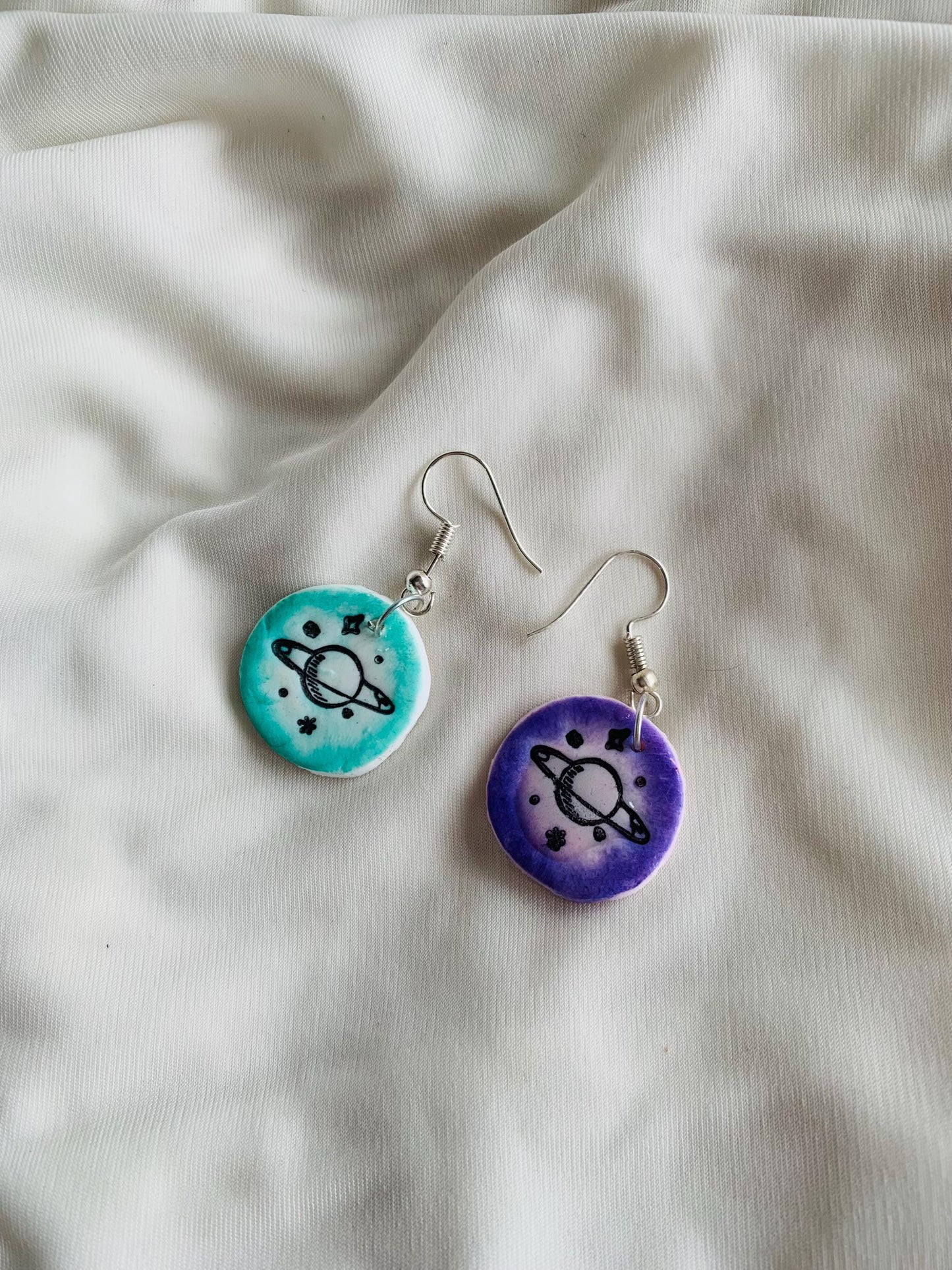Cute Saturn embossed two tone coloured Earrings especially made for Run seokjin ep tour of BTS Jin
