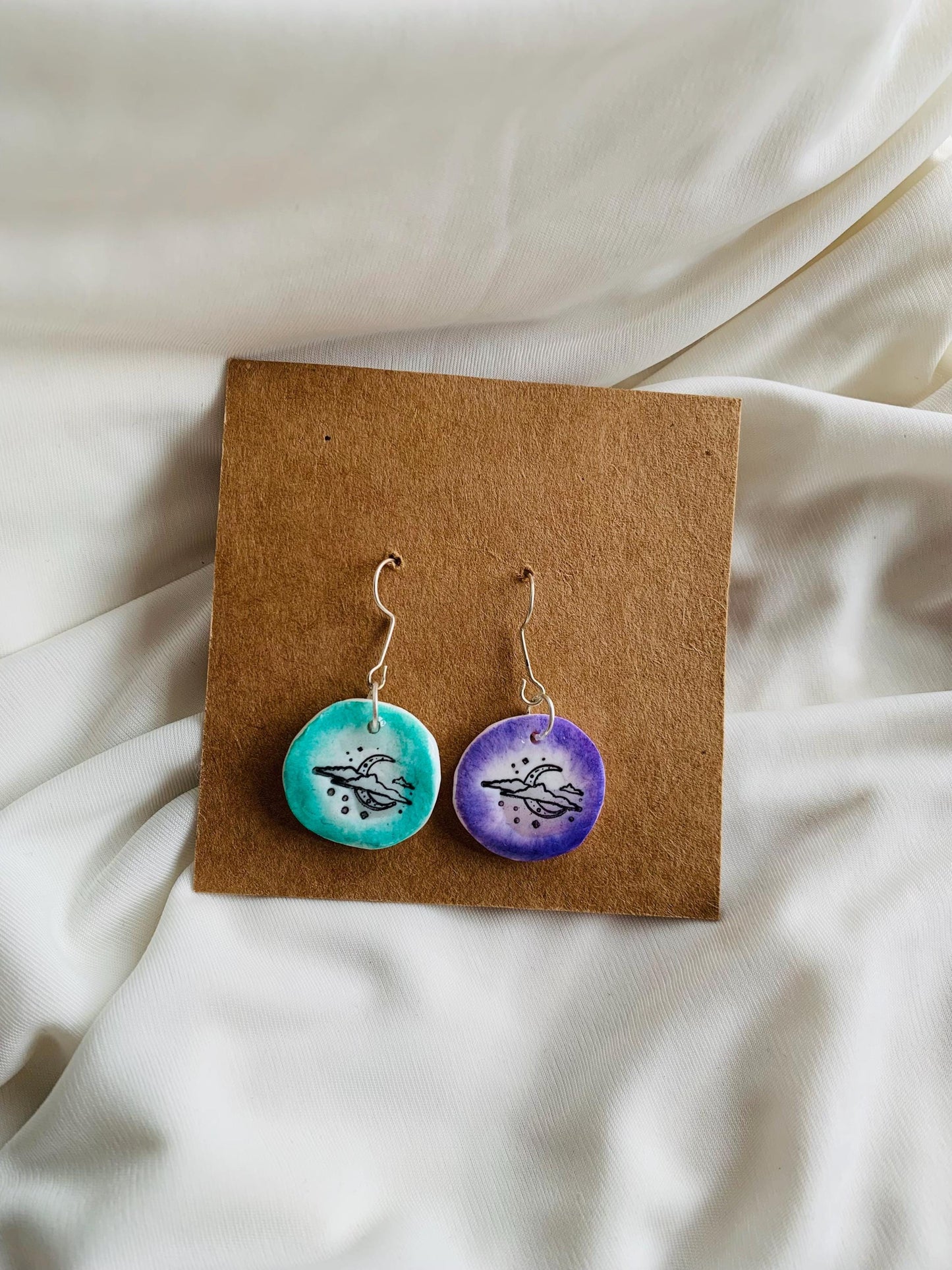 Moon hides behind the clouds embossed in two tone coloured Earrings especially made for Run seokjin ep tour of BTS Jin