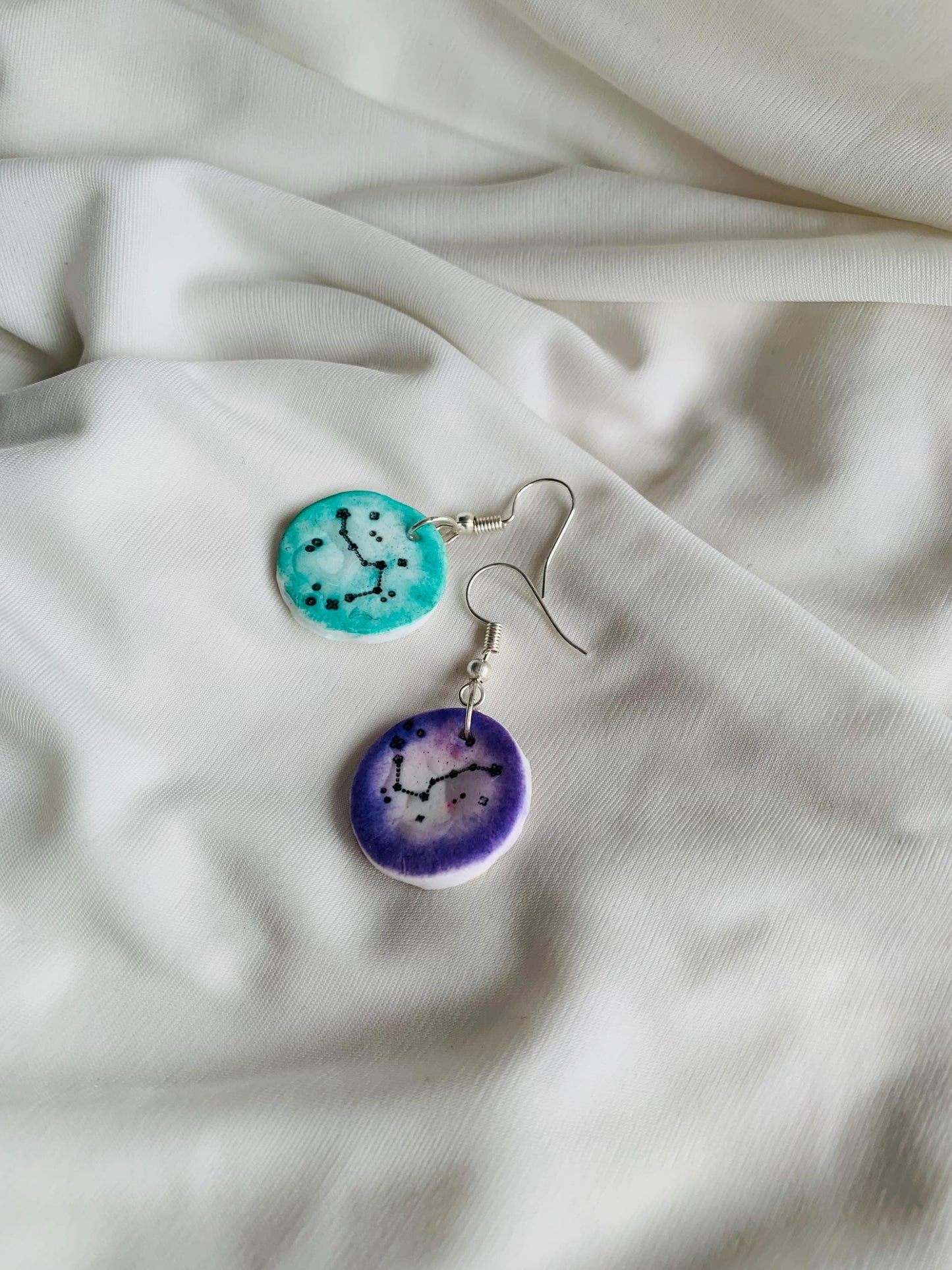 The plough star constellation embossed in two tone coloured Earrings especially made for Run seokjin ep tour of BTS Jin