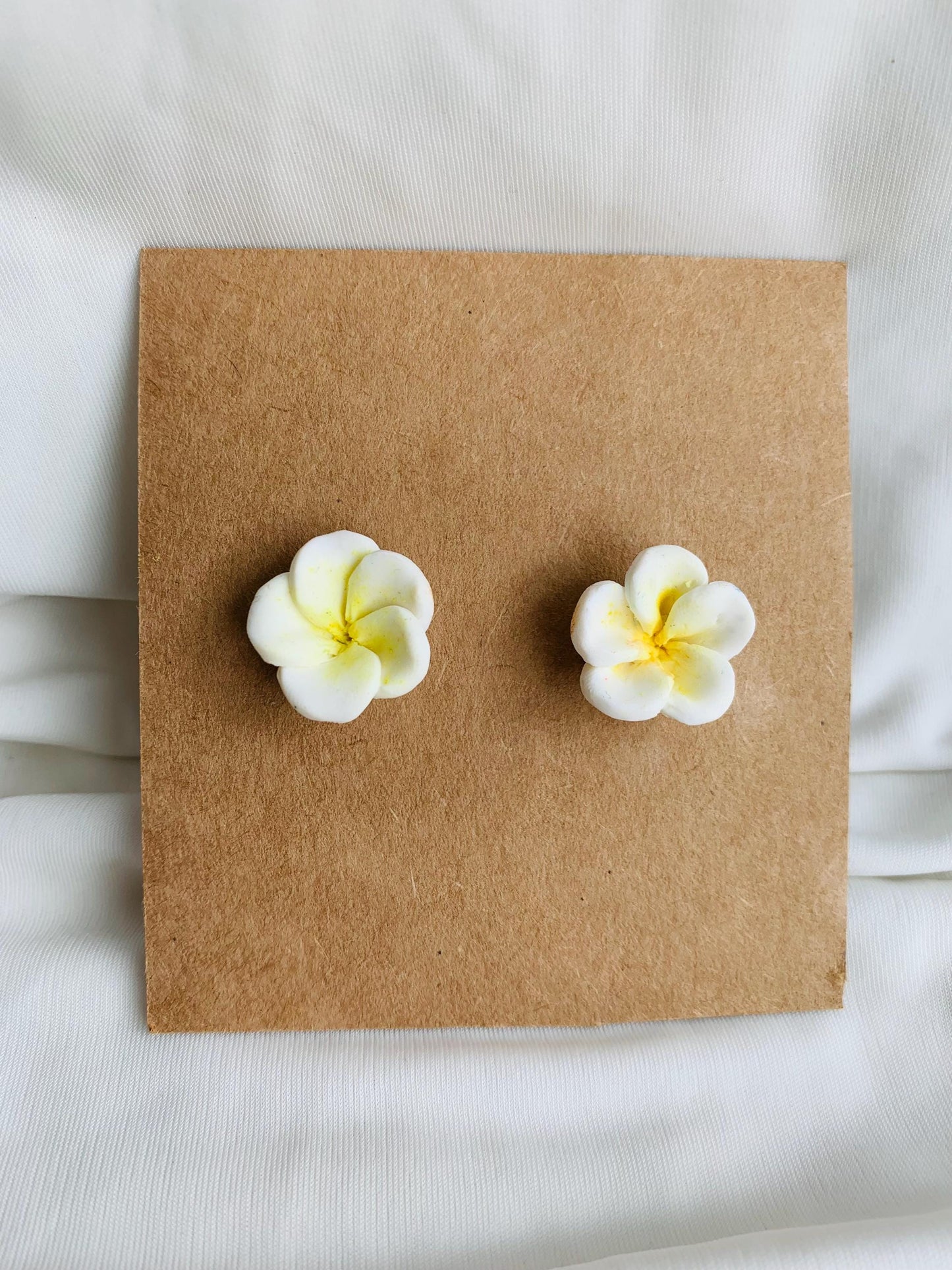 White plumeria flower stud earrings
