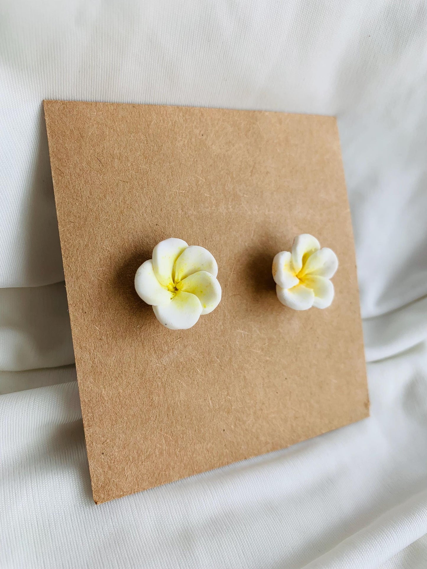 White plumeria flower stud earrings