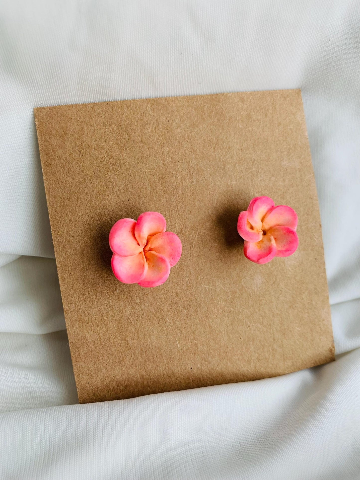 White and pink plumeria flower stud earrings