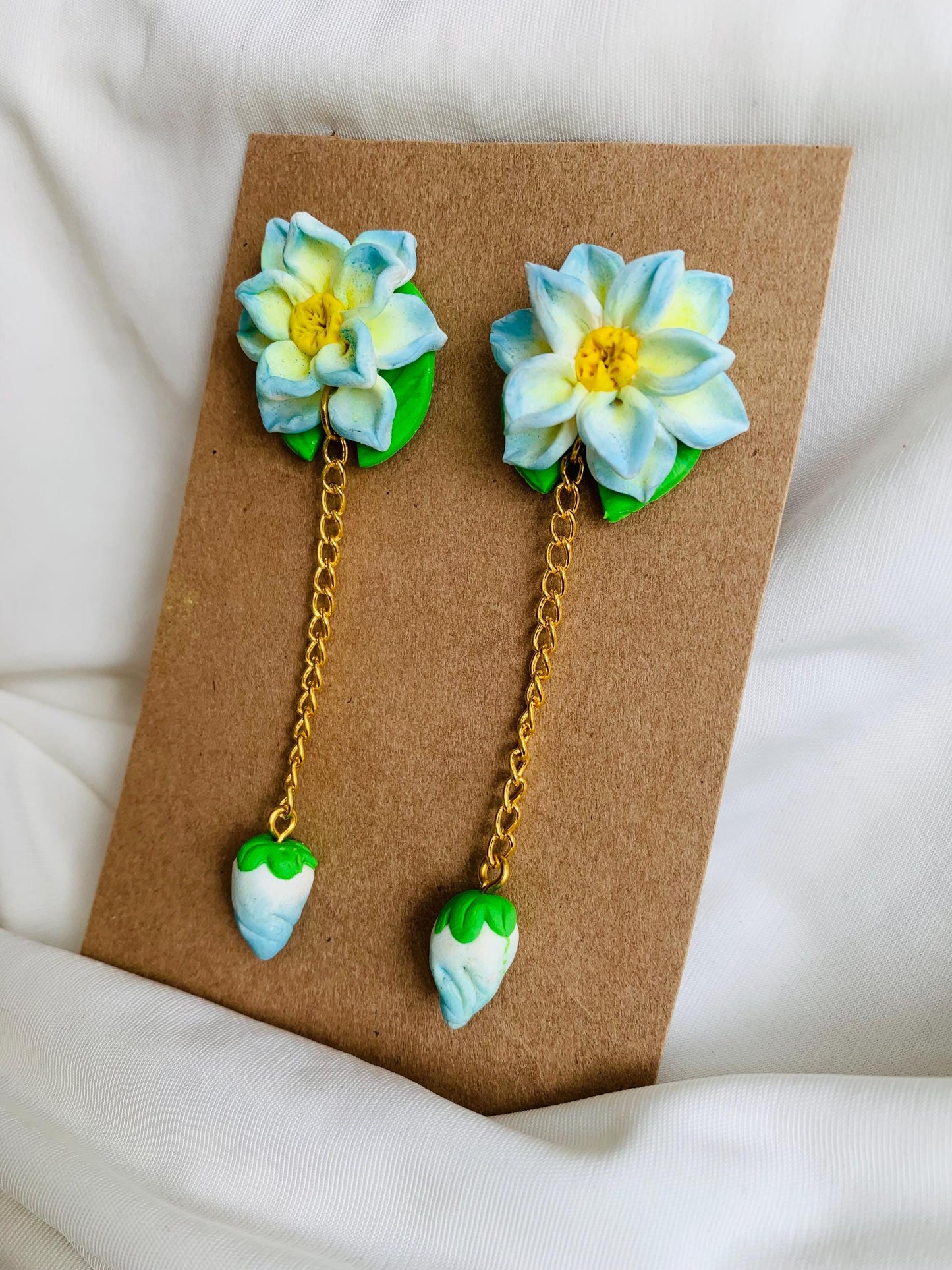 Blue lotus with a lotus bud dangle and drop earrings