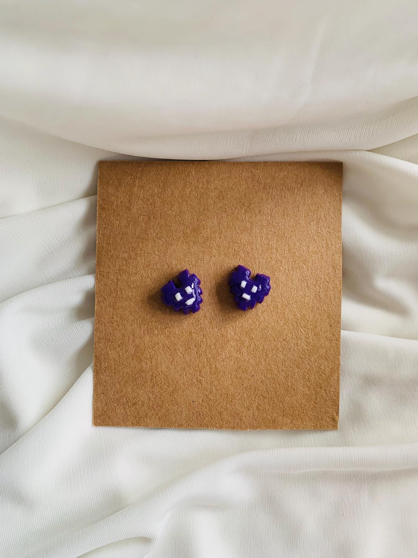 Jin astronaut Wootteo heart earrings