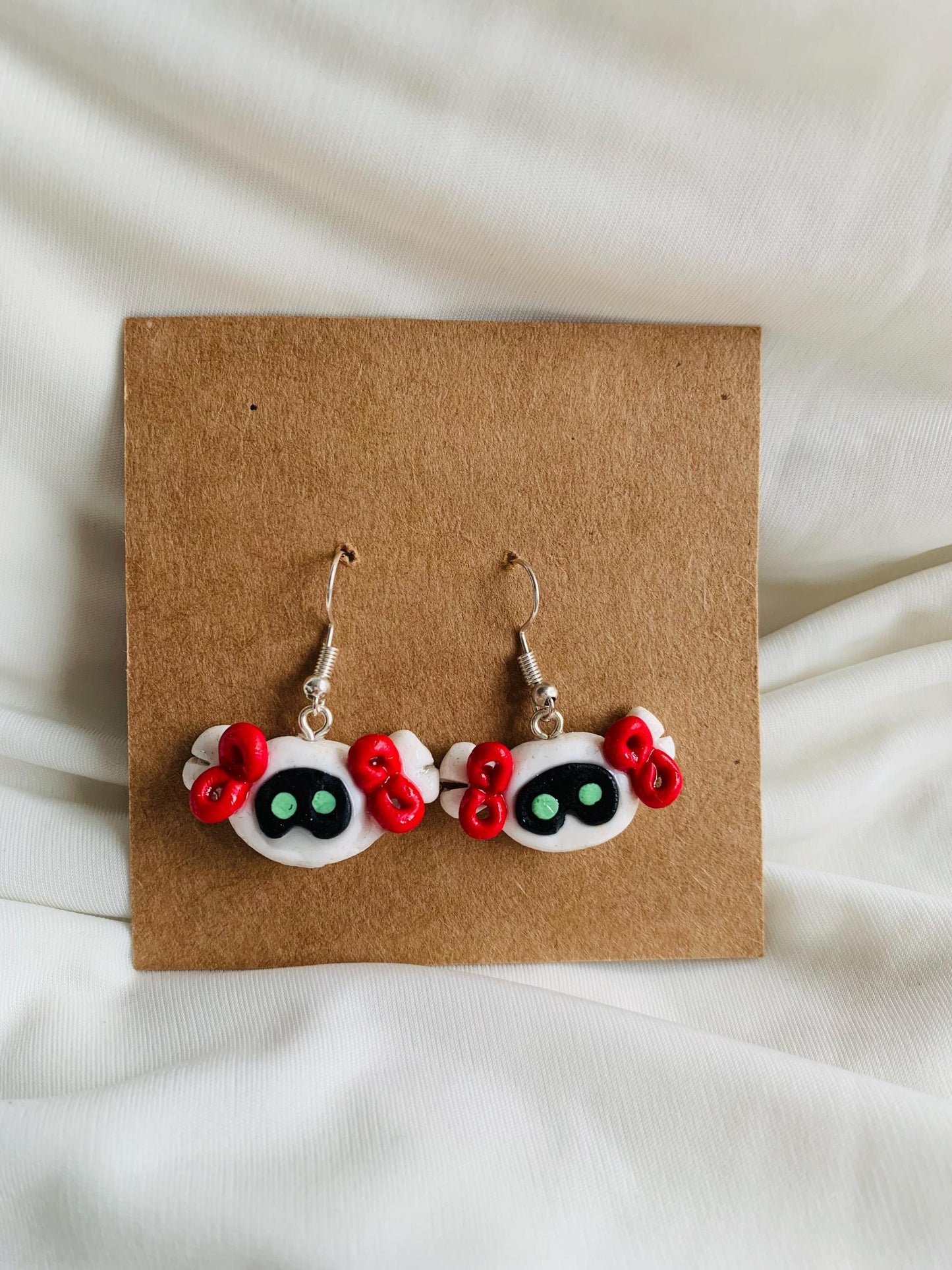 BTS Jin Wootteo in cute little bows earrings