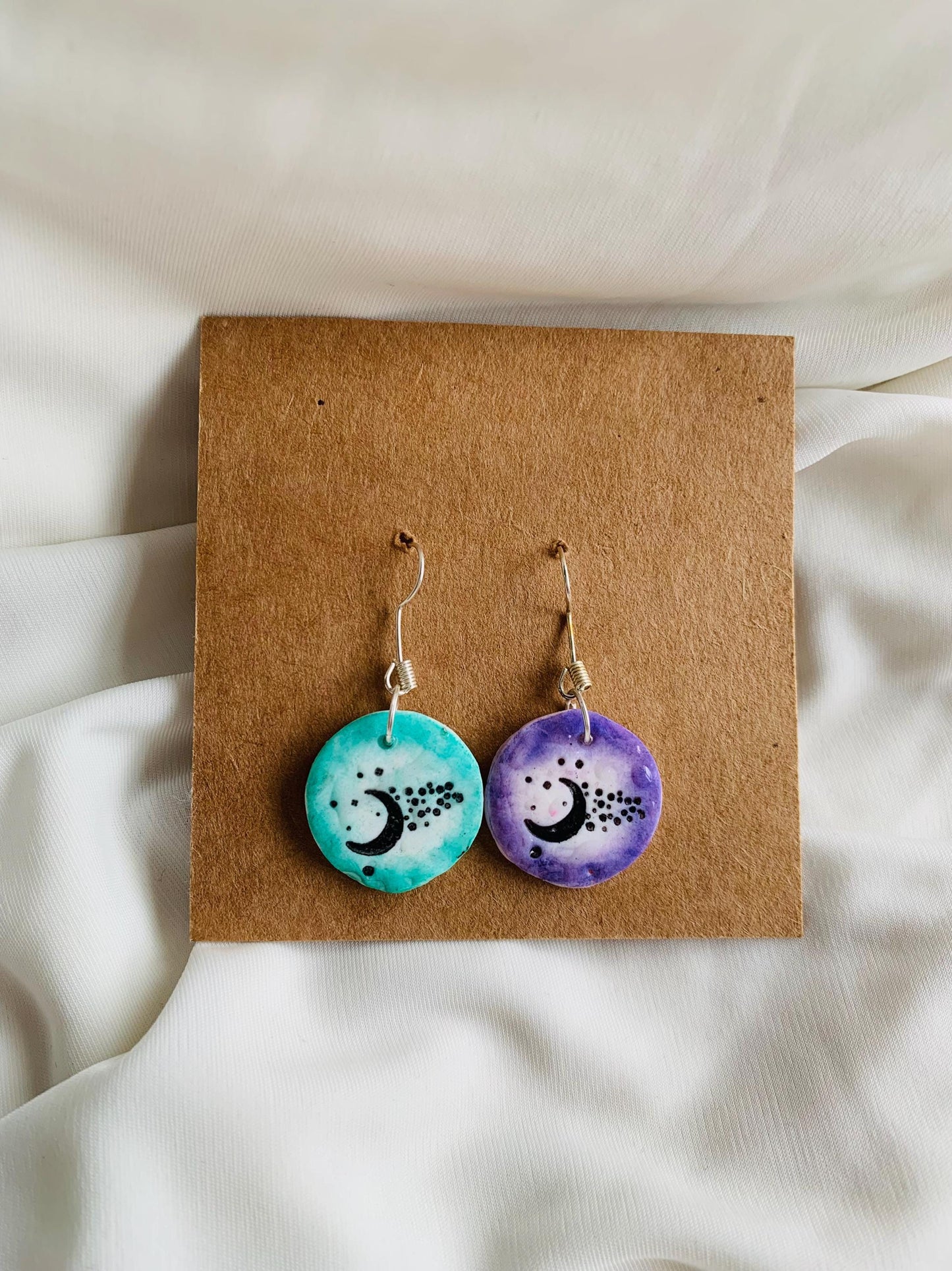 Moon with star cluster embossed in two tone coloured Earrings especially made for Run seokjin ep tour of BTS Jin
