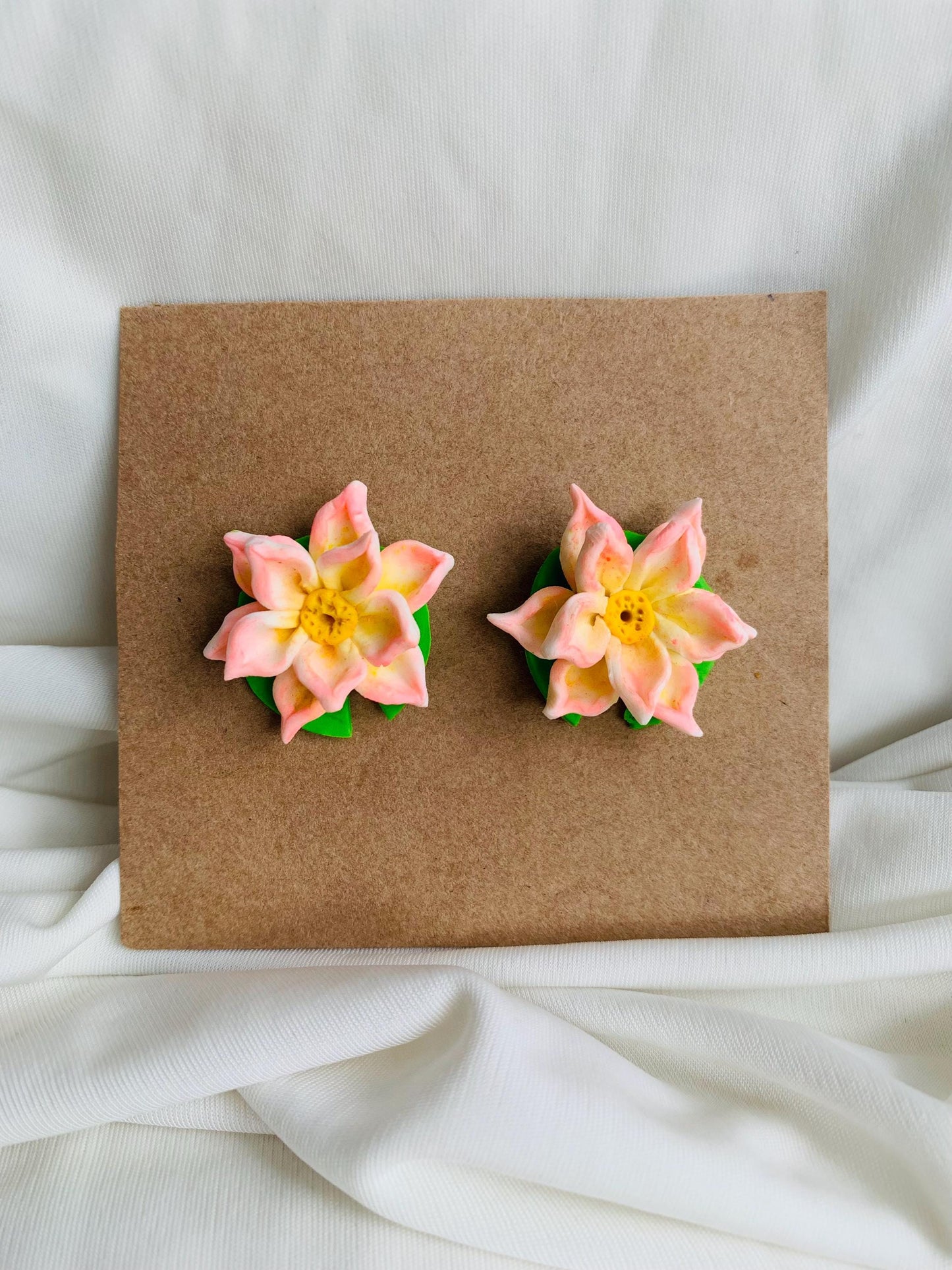 Pink lotus with a lotus leaf stud earrings