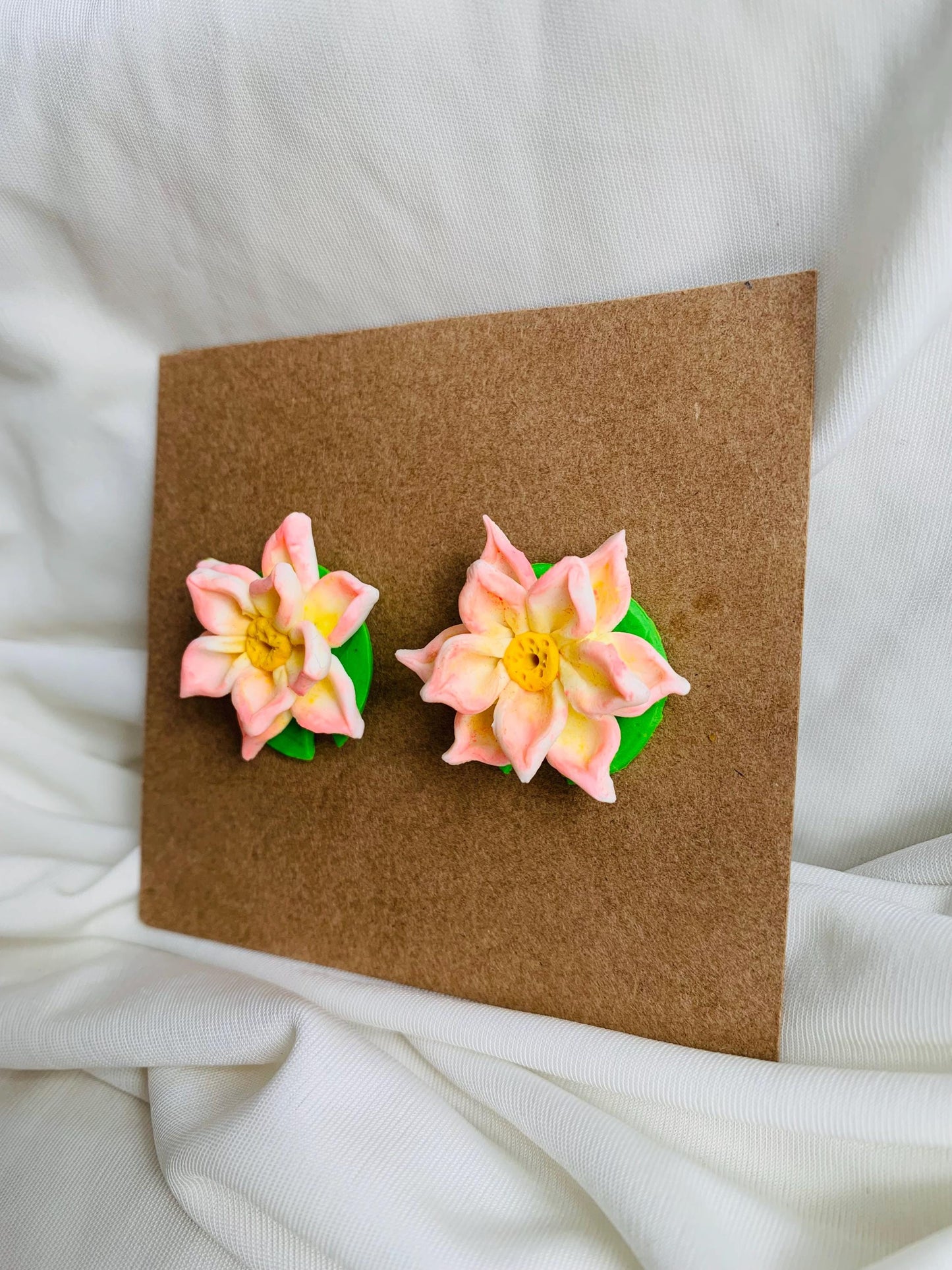 Pink lotus with a lotus leaf stud earrings